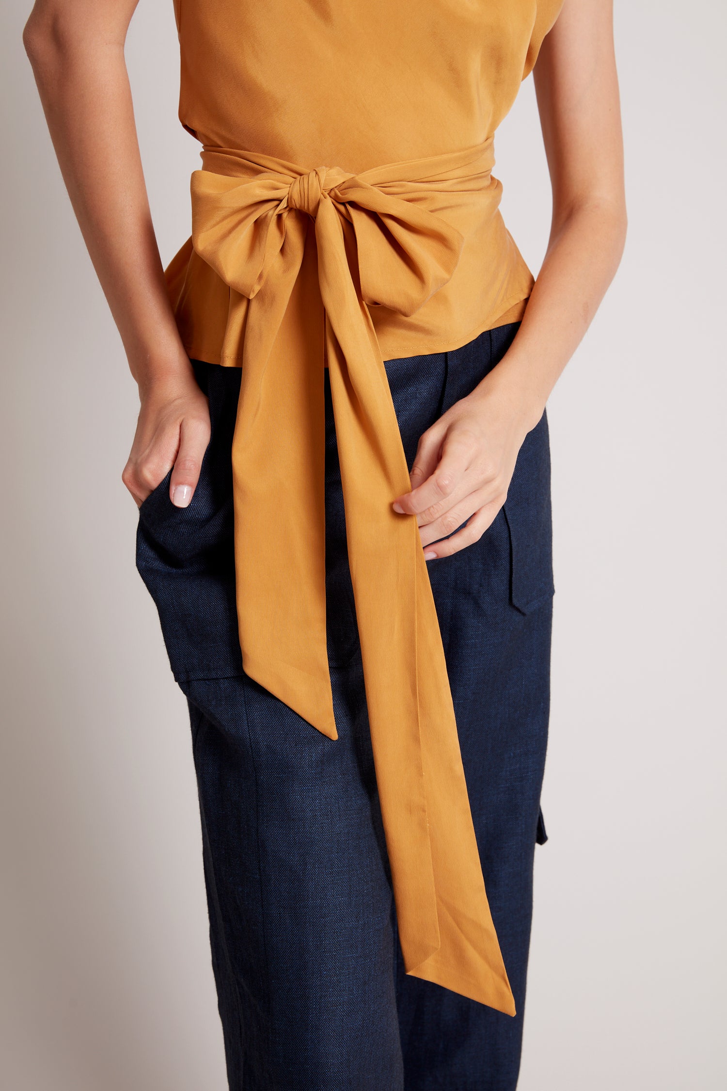 Remi sleeveless wrap top