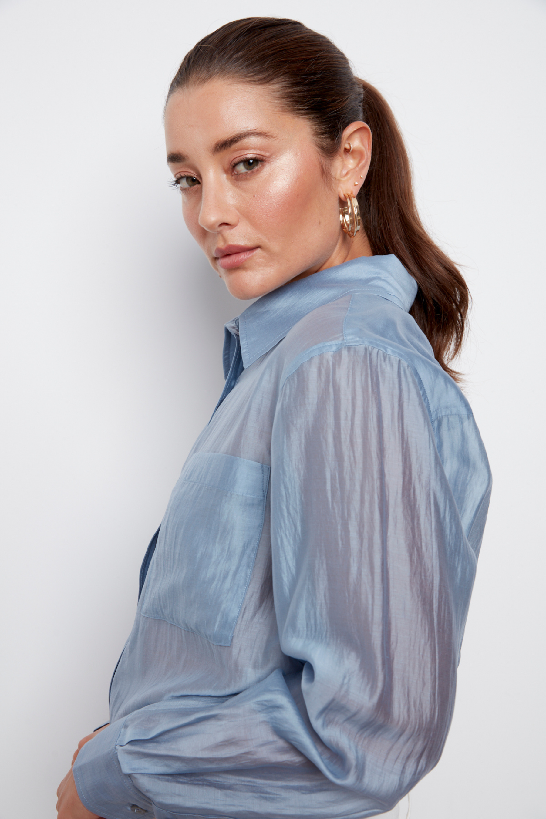 Bijou, semi-transparent button-front shirt with patch pockets and side slits