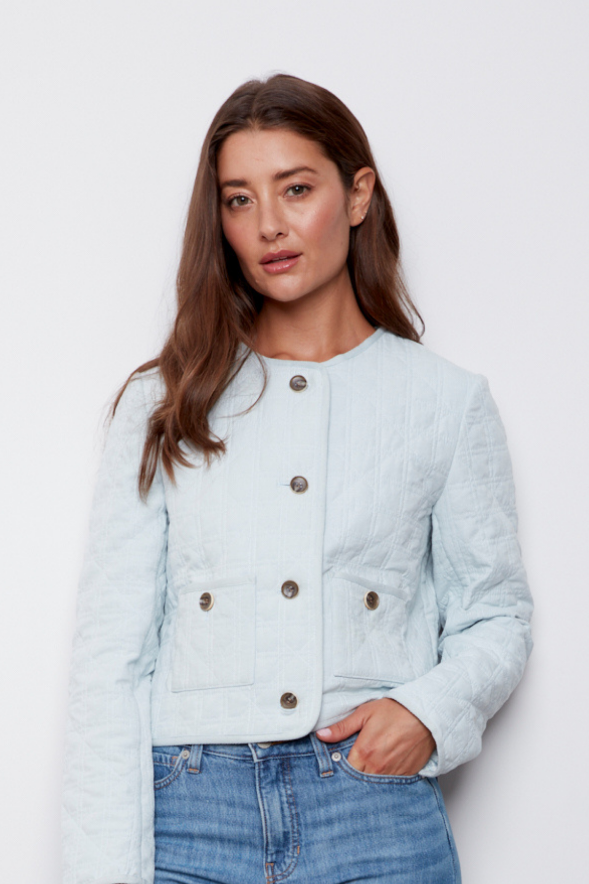 Caya, quilted collarless buttoned front jacket