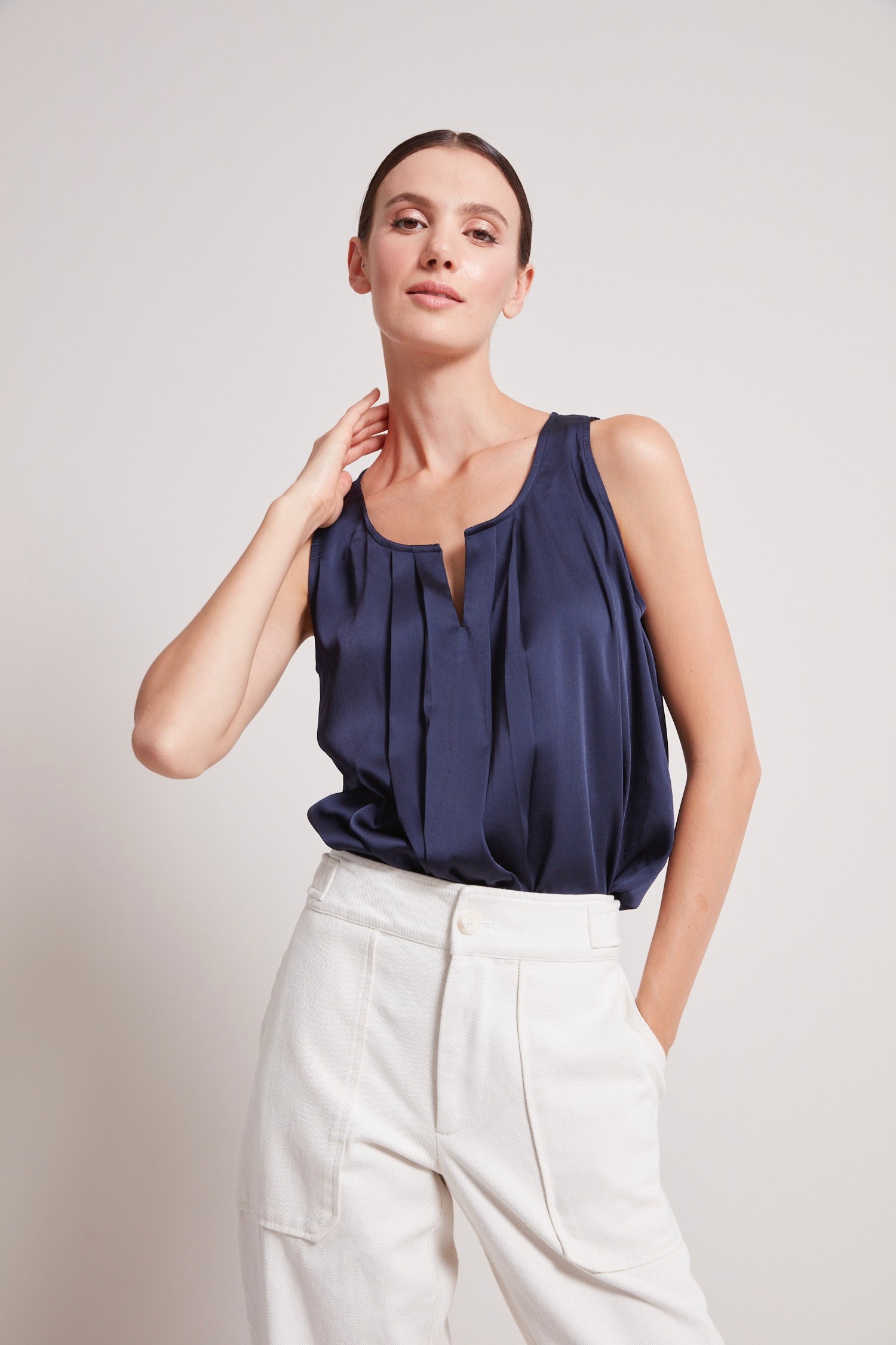 Tasha sleeveless front key hole blouse